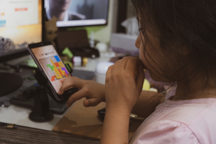 Parent and child looking at a tablet together